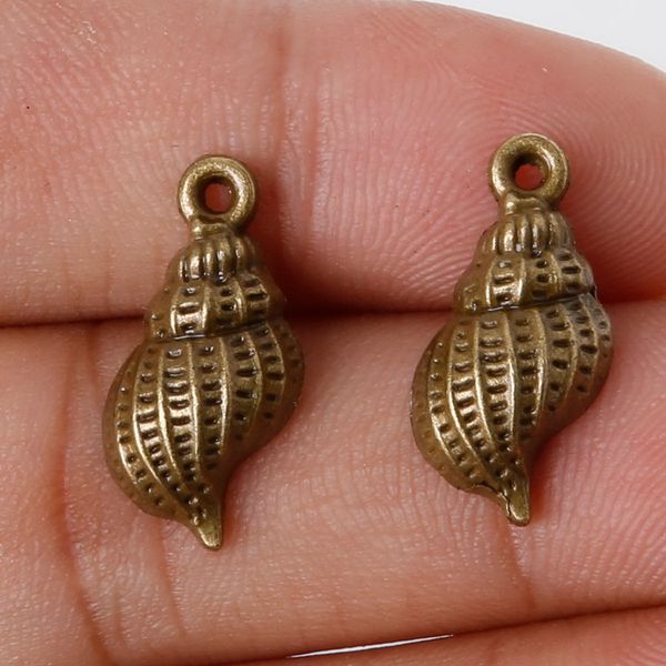 new new arrival 11pcs 19x9mm antique bronze metal pendant conch charms jewelry findings accessories for diy jewelry making di, Bronze;silver
new new arrival 11pcs 19x9mm antique bronze metal pendant conch charms jewelry findings accessories for diy jewelry making di, Bronze;silver