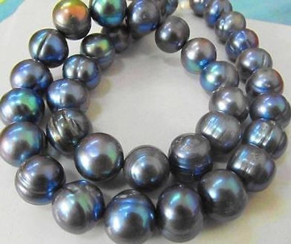 REAL NATURAL 12-13MM SOUTH SEA BLACK BLUE BAROQUE PEARL NECKLACE 18 INCH 14k GOLD CLASP
REAL NATURAL 12-13MM SOUTH SEA BLACK BLUE BAROQUE PEARL NECKLACE 18 INCH 14k GOLD CLASP
