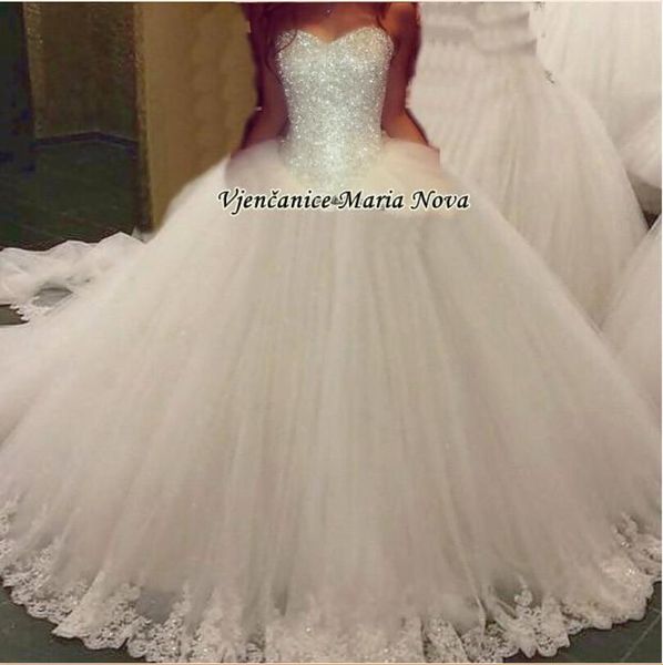 White New Elegant Sweetheart Tulle Ball Gown Wedding Dresses Beaded Top Lace-Up Applique Floor length Bridal Gowns
White New Elegant Sweetheart Tulle Ball Gown Wedding Dresses Beaded Top Lace-Up Applique Floor length Bridal Gowns