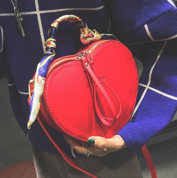 Heart shape designer shoulder bags for women autumn new tide ribbons women bags PU famous brand party evening women bags free shipping 
Heart shape designer shoulder bags for women autumn new tide ribbons women bags PU famous brand party evening women bags free shipping