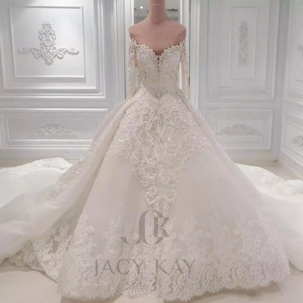 luxury ball gown arabic wedding dresses off the shoulder lace appliqued sequins bridal gowns vintage cathedral train plus size wedding gown, White
luxury ball gown arabic wedding dresses off the shoulder lace appliqued sequins bridal gowns vintage cathedral train plus size wedding gown, White