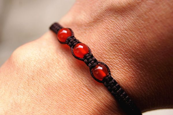 pure manual weaving caramel peace "+ 3 red agate beads (even in three yuan) lucky bracelet, Black
pure manual weaving caramel peace "+ 3 red agate beads (even in three yuan) lucky bracelet, Black