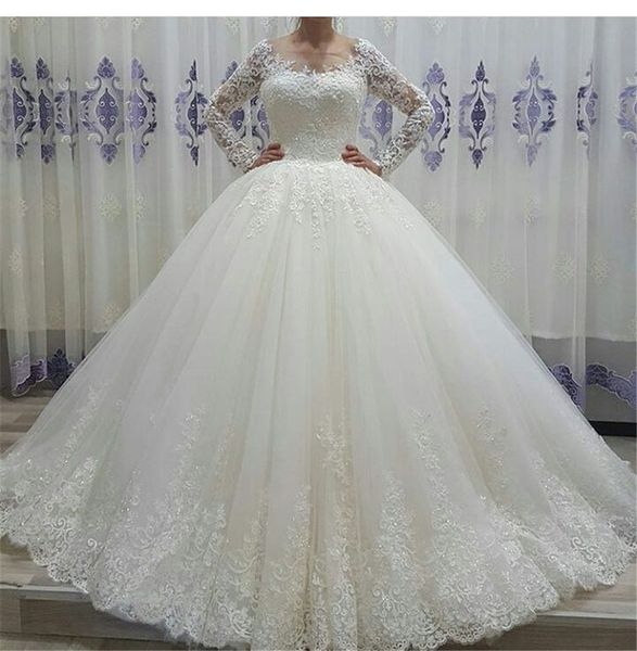 sheer scoop neck long sleeve ball gowns long appliqued and beaded ball gowns wedding dress white tulle bridal wedding gowns
sheer scoop neck long sleeve ball gowns long appliqued and beaded ball gowns wedding dress white tulle bridal wedding gowns