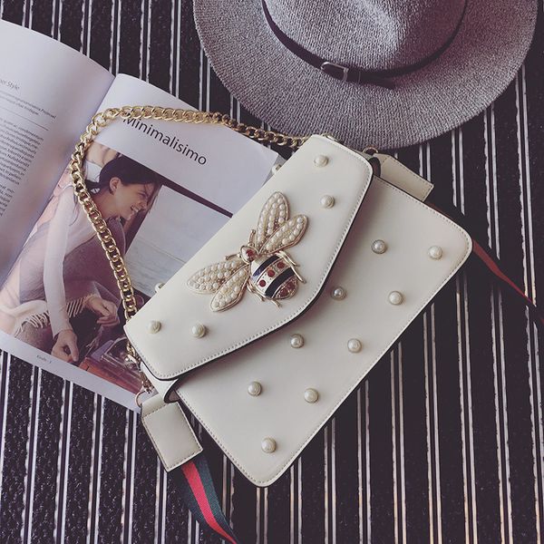 factory brand handbag lovely rhinestone chain bag elegant woman bee pearl decorative leather shoulder bag women bag small fresh pearl spring
factory brand handbag lovely rhinestone chain bag elegant woman bee pearl decorative leather shoulder bag women bag small fresh pearl spring