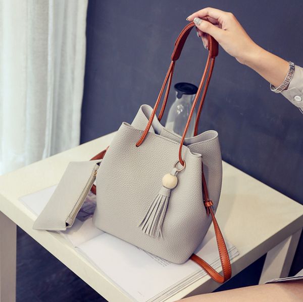 wholesale- purses new 2016 fashion litchi leather drawstring tassel bucket bag shoulder/messenger high-grade women handbags
wholesale- purses new 2016 fashion litchi leather drawstring tassel bucket bag shoulder/messenger high-grade women handbags