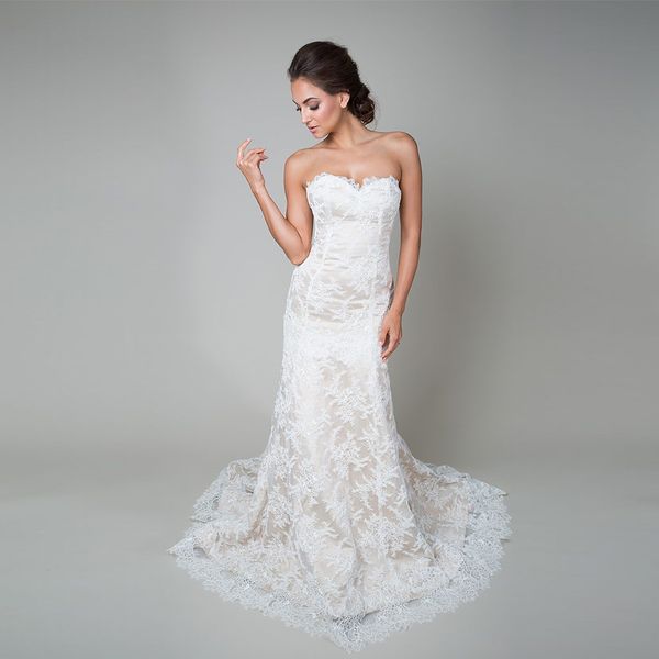 trumpet style wedding gown champagne base with corded lace a pinched sweetheart neckline low back covered buttons bridal dress, White
trumpet style wedding gown champagne base with corded lace a pinched sweetheart neckline low back covered buttons bridal dress, White