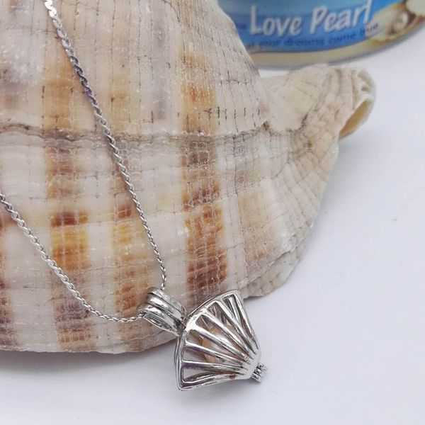 High quality pearl cages pendants necklaces Opening pearls cage Copper Floating Locket Shells Charms necklace For women Fashion Jewelry
High quality pearl cages pendants necklaces Opening pearls cage Copper Floating Locket Shells Charms necklace For women Fashion Jewelry