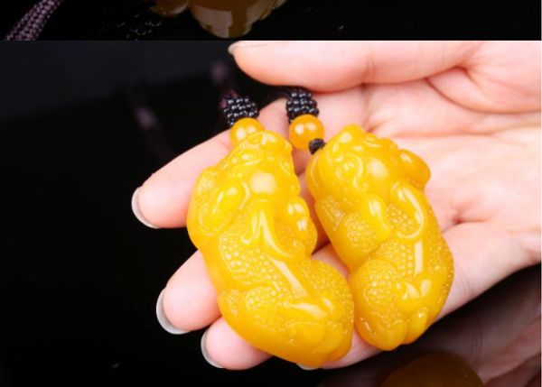 hand-carved natural orange yellow dragon jade. (couple's style) a retro charm necklace pendant, Silver
hand-carved natural orange yellow dragon jade. (couple's style) a retro charm necklace pendant, Silver