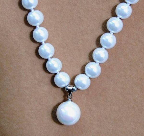 8mm white akoya shell pearl round beads pendant(12mm) hand knotted necklace 18", Silver
8mm white akoya shell pearl round beads pendant(12mm) hand knotted necklace 18", Silver