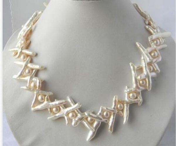 amazing 20mmx35mm white baroque freshwater pearl silver necklace
amazing 20mmx35mm white baroque freshwater pearl silver necklace