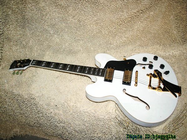 White cu tom hop 335 jazz guitar emi hollow body tremolo new arrival whole ale 
White cu tom hop 335 jazz guitar emi hollow body tremolo new arrival whole ale
