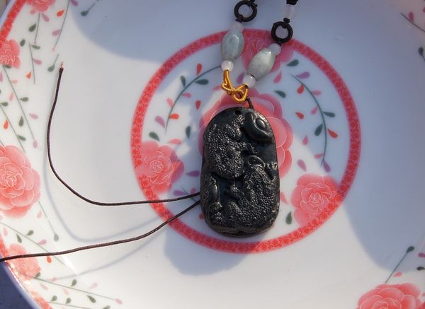 hand-carved natural dark green jade. the elliptical antique double cicada yuanbao lucky necklace pendant., Silver
hand-carved natural dark green jade. the elliptical antique double cicada yuanbao lucky necklace pendant., Silver