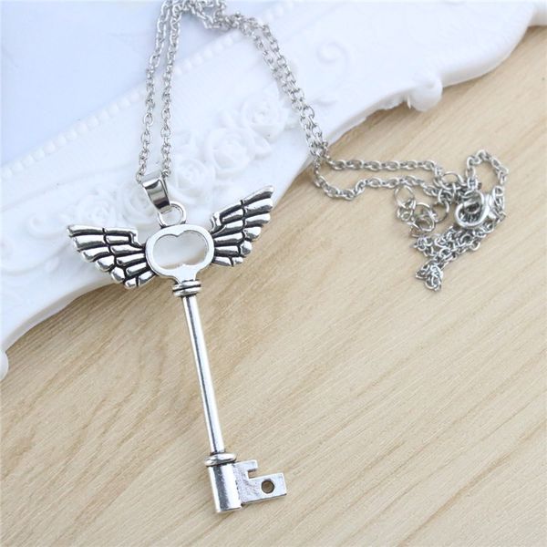 fashion women cute key wing pendant necklace silver plated alloy long chain necklaces for girls gift
fashion women cute key wing pendant necklace silver plated alloy long chain necklaces for girls gift