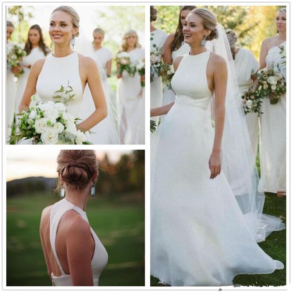 2017 New Elegant Satin Sleeveess Halter Mermaid Wedding Dresses Backless Ruffle Organza Over skirt Court Train Wedding Bridal Gowns, White
2017 New Elegant Satin Sleeveess Halter Mermaid Wedding Dresses Backless Ruffle Organza Over skirt Court Train Wedding Bridal Gowns, White