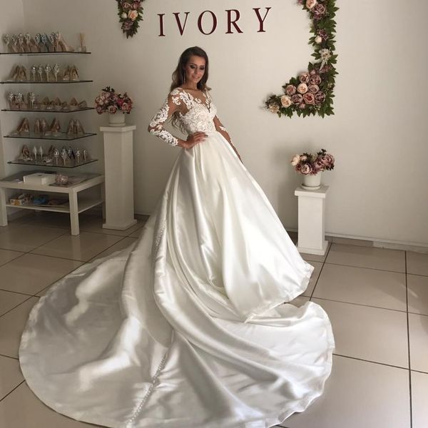 romantic white satin wedding dresses sheer v-neck lace applique long sleeve bridal wedding gowns elegant a-line chapel train bridal dresses
romantic white satin wedding dresses sheer v-neck lace applique long sleeve bridal wedding gowns elegant a-line chapel train bridal dresses