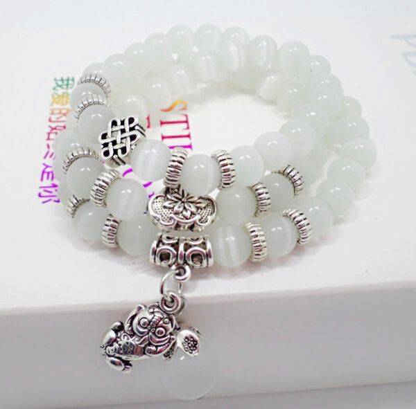 new european and american natural cat's eye bracelet, white crystal female fashion jewelry, Black
new european and american natural cat's eye bracelet, white crystal female fashion jewelry, Black