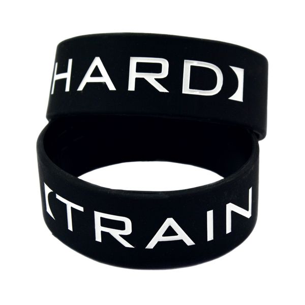 50pcs train hard 1 inch wide silicone rubber bracelet black size for sports promotional gift 
50pcs train hard 1 inch wide silicone rubber bracelet black size for sports promotional gift