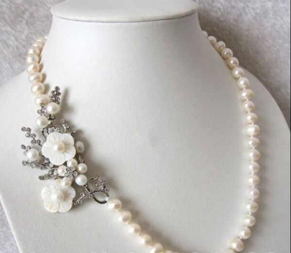 beautiful natural 7-8mm white freshwater pearl necklace shell flower clasp 20 ", Silver
beautiful natural 7-8mm white freshwater pearl necklace shell flower clasp 20 ", Silver