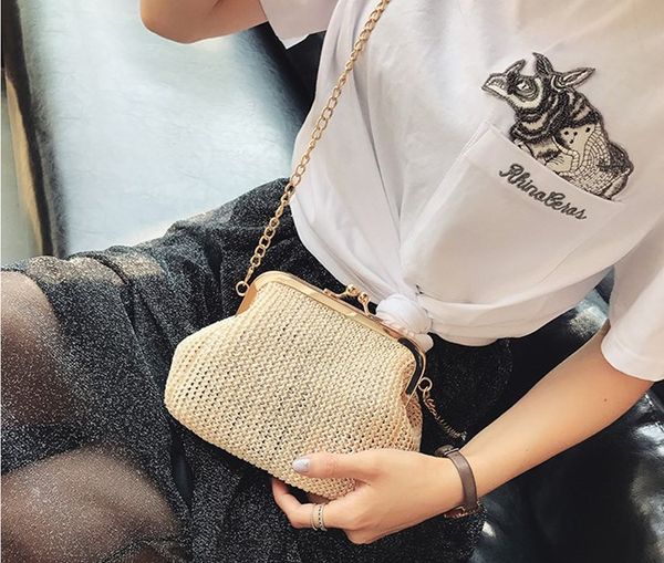 2017. plant material. shell shape. fashion casual bag. beach bag. metal chain. women's bags. girl. straw. soft. small. mini. shoulder b 
2017. plant material. shell shape. fashion casual bag. beach bag. metal chain. women's bags. girl. straw. soft. small. mini. shoulder b