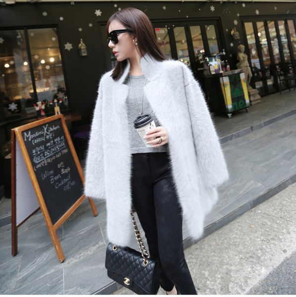 Wholesale- genuine mink cashmere sweater women pure cashmere cardigan knitted mink jacket fashion winter long fur coat free shipping S125
Wholesale- genuine mink cashmere sweater women pure cashmere cardigan knitted mink jacket fashion winter long fur coat free shipping S125