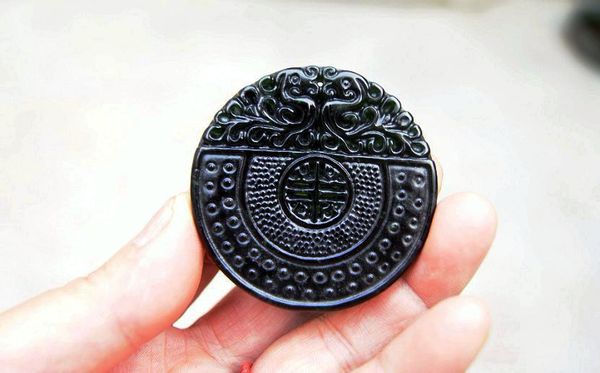 the nature of hand-carved, dark green jade, archaize (shou gu twin phoenix). necklace pendant, Silver
the nature of hand-carved, dark green jade, archaize (shou gu twin phoenix). necklace pendant, Silver