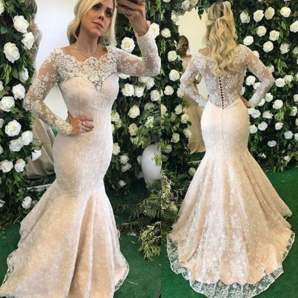 beautiful lace appliqued mermaid wedding dresses beaded sequined long sleeves mermaid bridal gowns with buttons back, White
beautiful lace appliqued mermaid wedding dresses beaded sequined long sleeves mermaid bridal gowns with buttons back, White