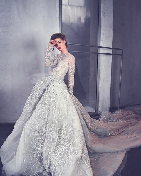 sliver luxury wedding dresses sheer bridal gowns with long sleeves full bead detachable train dress for wedding, White
sliver luxury wedding dresses sheer bridal gowns with long sleeves full bead detachable train dress for wedding, White