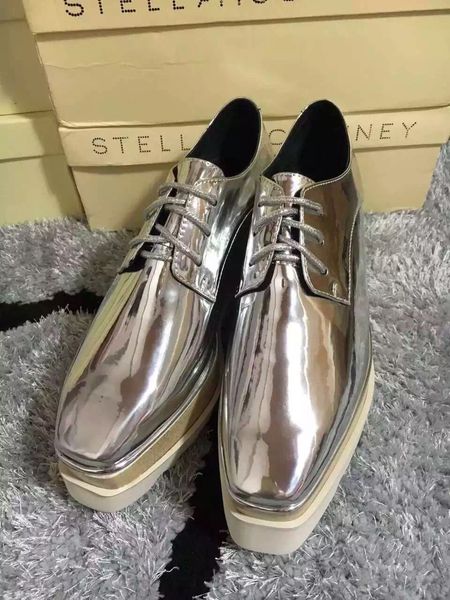 stella mccartney metallic elyse stars shoes silver patent leather with white sole low top, Black
stella mccartney metallic elyse stars shoes silver patent leather with white sole low top, Black
