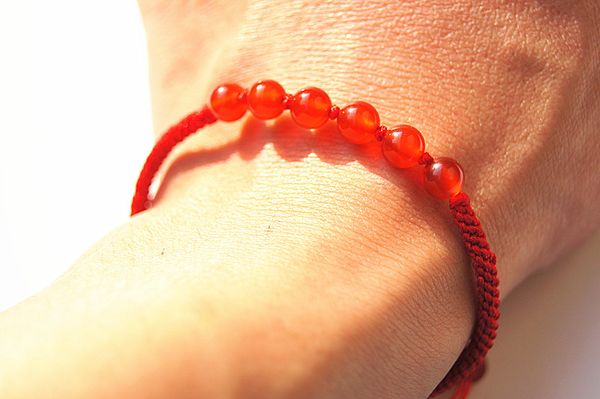 hand catenary, pure manual weaving red knot + hong kong garden red agate beads bracelet., White
hand catenary, pure manual weaving red knot + hong kong garden red agate beads bracelet., White