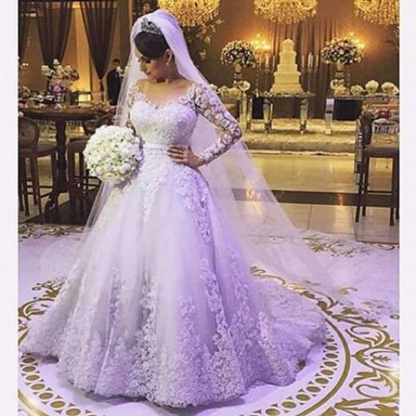 ball gown sheer long sleeve wedding dresses lace applique beaded v-neck bridal gowns chapel train vestido de casamento actual image, White
ball gown sheer long sleeve wedding dresses lace applique beaded v-neck bridal gowns chapel train vestido de casamento actual image, White