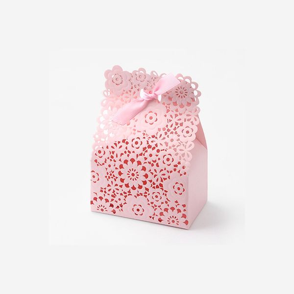 pink hollow out candy boxes hand made gift wrap with bowknot wedding party favor packaging
pink hollow out candy boxes hand made gift wrap with bowknot wedding party favor packaging