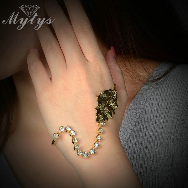 mytys yellow gp leaf shape and bazel sets crystal palm bangle handlets palm bracelet r909, Black
mytys yellow gp leaf shape and bazel sets crystal palm bangle handlets palm bracelet r909, Black