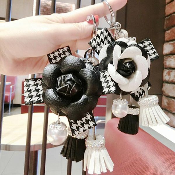 leather flower keychain tassel pearl pendant key chains car ornaments charm for women buckle pearl key ring, Silver
leather flower keychain tassel pearl pendant key chains car ornaments charm for women buckle pearl key ring, Silver