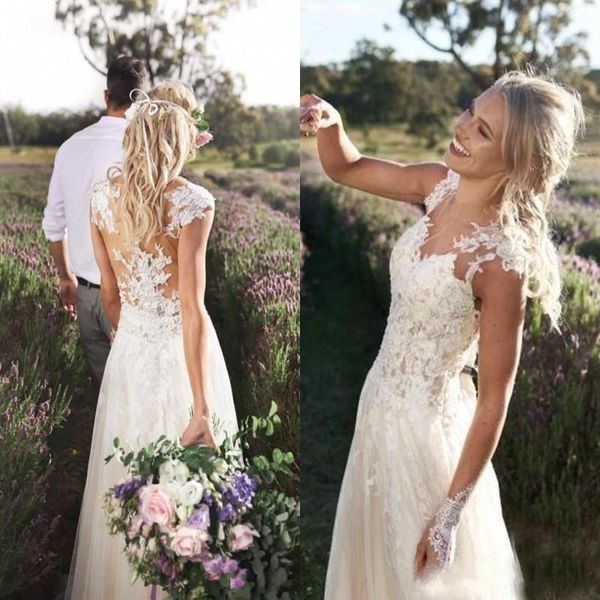 vintage bohemia beach a line wedding dresses cap sleeves lace appliqued boho bridal gowns plus size country wedding dress, White
vintage bohemia beach a line wedding dresses cap sleeves lace appliqued boho bridal gowns plus size country wedding dress, White