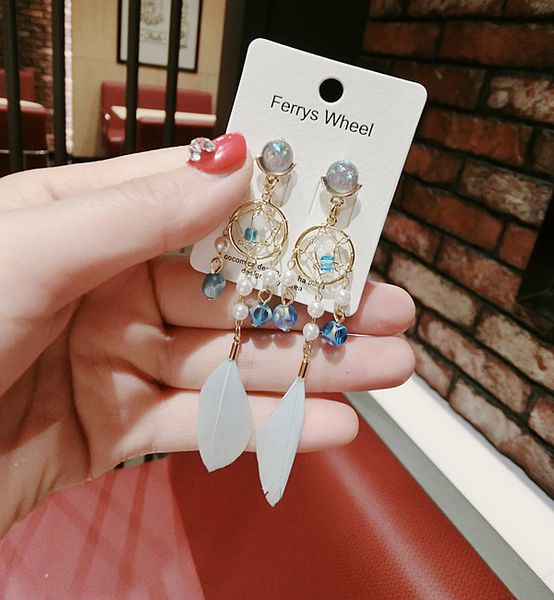 pearl crystal ladies korean fashion ear jewelry handmade wind chime crystal feather cartoon earrings earrings wholesale, Golden;silver
pearl crystal ladies korean fashion ear jewelry handmade wind chime crystal feather cartoon earrings earrings wholesale, Golden;silver