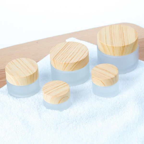 5/10/15/30/50g frosted glass jar skin care cream refillable bottle cosmetic container with wood grain lid eye cream jars f1100
5/10/15/30/50g frosted glass jar skin care cream refillable bottle cosmetic container with wood grain lid eye cream jars f1100