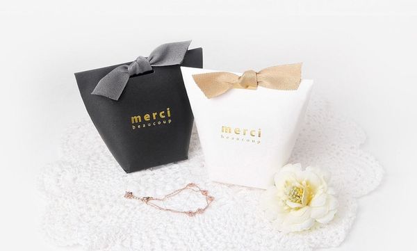 50pcs merci beaucoup white color wedding gift boxes paper cake box baby shower favor boxes candy box with ribbon
50pcs merci beaucoup white color wedding gift boxes paper cake box baby shower favor boxes candy box with ribbon