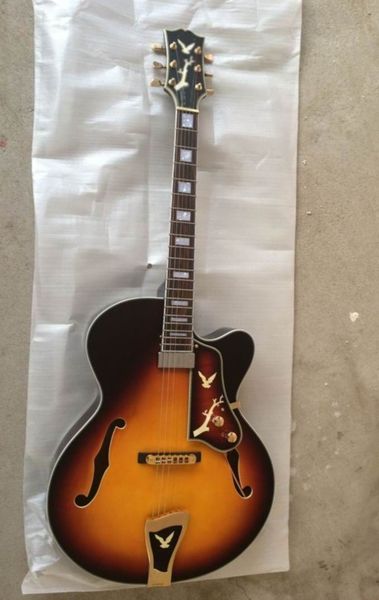 оптовая jazz guitar es-175 es175 semi hollow электрогитара в sunbrust es 175. гитара высшего качества музыкальный инструмент140910
оптовая jazz guitar es-175 es175 semi hollow электрогитара в sunbrust es 175. гитара высшего качества музыкальный инструмент140910