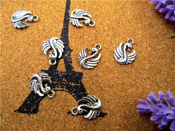 105pcs/lot swan charms pendants double sided 17 x 13mm tibetan silver once upon a time, Bronze;silver
105pcs/lot swan charms pendants double sided 17 x 13mm tibetan silver once upon a time, Bronze;silver