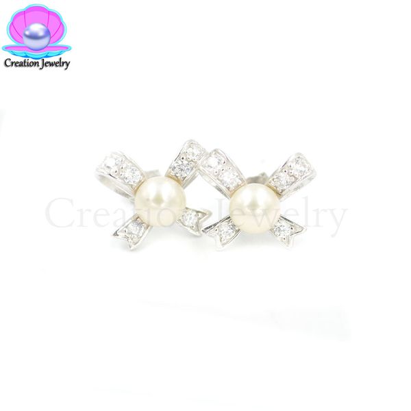 wholesale s925 sterling silver studs button pearls bow earrings with shining zirconia, Golden;silver
wholesale s925 sterling silver studs button pearls bow earrings with shining zirconia, Golden;silver