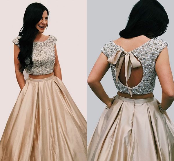 two piece champagne prom dresses heavy beaded cap sleeves satin puffy skirt backless sweet 16 dresses party dresses with pocket, Black
two piece champagne prom dresses heavy beaded cap sleeves satin puffy skirt backless sweet 16 dresses party dresses with pocket, Black