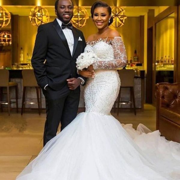 2018 new african mermaid wedding dress luxury lace off the shoulder beaded tulle sweep train wedding gown covered button bridal dresses, White
2018 new african mermaid wedding dress luxury lace off the shoulder beaded tulle sweep train wedding gown covered button bridal dresses, White