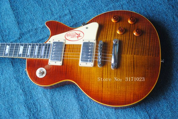 Factory cu tom electric guitar with flame maple veneer and ebony fretboard can be cu tomized
Factory cu tom electric guitar with flame maple veneer and ebony fretboard can be cu tomized
