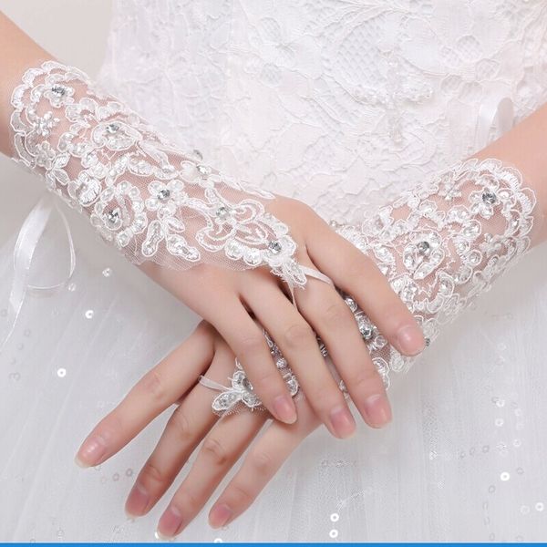 fingerless wrist length lace appliques white bridal wedding gloves luva de noiva
fingerless wrist length lace appliques white bridal wedding gloves luva de noiva