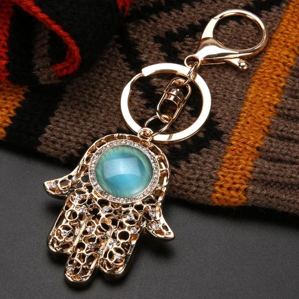 2018 fashion keychain lucky charm hamas fatima hand shape evil eye keychains women car bag buckle pendant keyrings holder, Silver
2018 fashion keychain lucky charm hamas fatima hand shape evil eye keychains women car bag buckle pendant keyrings holder, Silver