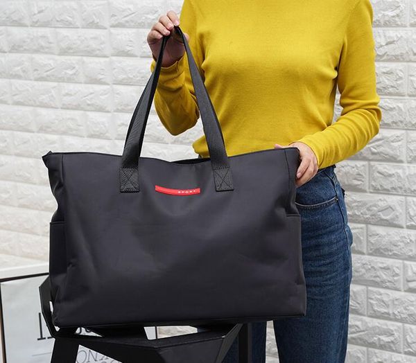 New tyle female large capacity duffel bag imple lightweight portable travel bag waterproof port bag
New tyle female large capacity duffel bag imple lightweight portable travel bag waterproof port bag