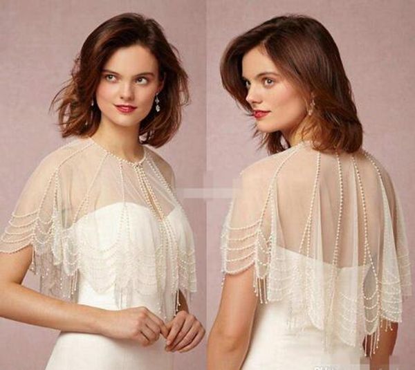 Роскошный белый Ivory Свадебные Wrap Jacket шеи экипажа с сочащейся Pearl наминка сшитое Shee
Роскошный белый Ivory Свадебные Wrap Jacket шеи экипажа с сочащейся Pearl наминка сшитое Shee