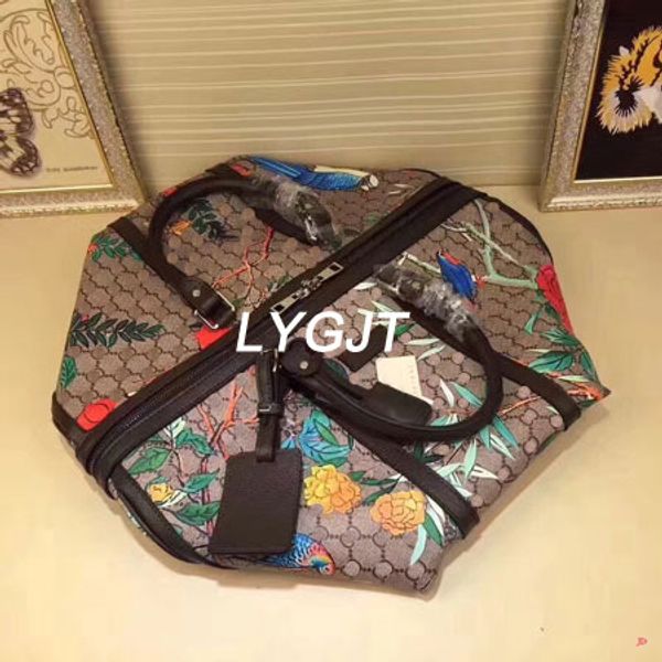 2018 NEW Genuine Leather fashion men women travel bag duffle bag, brand designer luggage handbags large capacity sport bag 45CM
2018 NEW Genuine Leather fashion men women travel bag duffle bag, brand designer luggage handbags large capacity sport bag 45CM