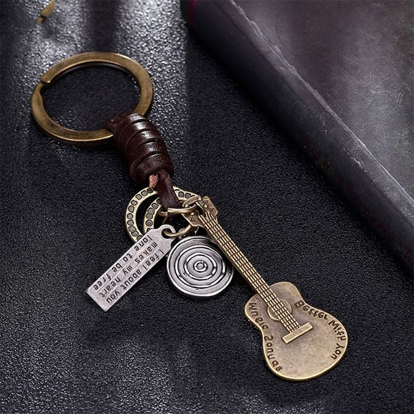 Genuine leather brass metal guitar pendant auto motorcycle keychain Key ring holder cover chain for car keys bags purse handbag
Genuine leather brass metal guitar pendant auto motorcycle keychain Key ring holder cover chain for car keys bags purse handbag
