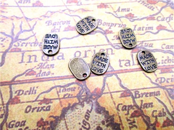 150pcs--made with love charms, antique bronze made with love charm pendants,tear drop, jewelry making 11x8mm, Bronze;silver
150pcs--made with love charms, antique bronze made with love charm pendants,tear drop, jewelry making 11x8mm, Bronze;silver